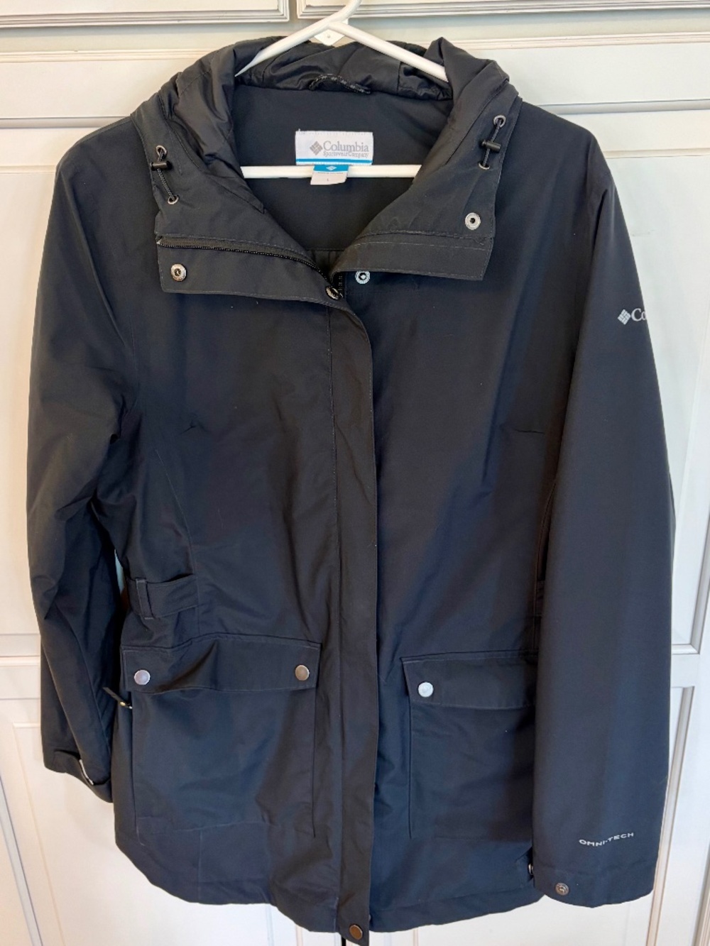 Women’s black Columbia Omni heat raincoat